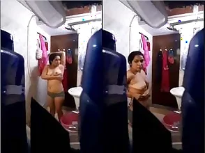 Beautiful bhabhi taking a sensual bath, hidden camera video